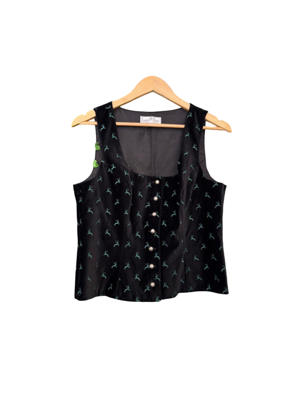 Land Haus M Schwarz mit grünen Mustern